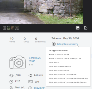 Screenshot of the bottom right corner underneath the individual image display on Flickr. The blue arrow next to the current Creative Commons licence has been clicked and all of the licence options are displayed in a drop down menu.