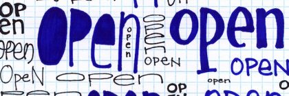 Paper covered with the word "Open" in different sizes