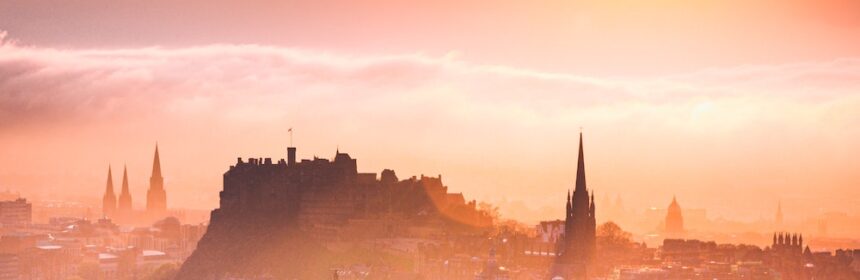 Photograph of Edinburgh skyline at sunset.
