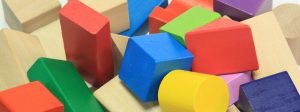 stack of colorful wooden building blocks